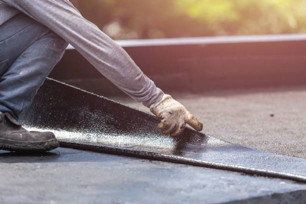 Professional Waterproofing technician working in Carmel, IN